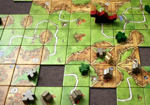 Carcassonne losetas en mesa (ilustrativa)