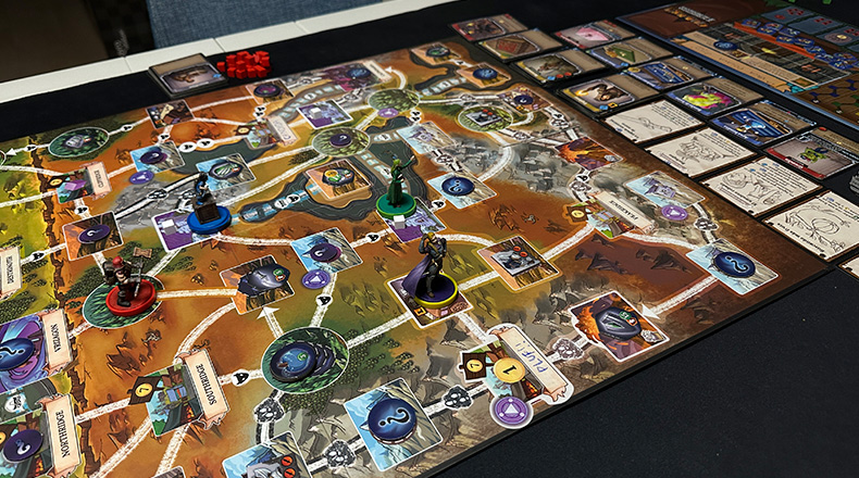 Grupo de amigos jugando a juegos de mesa modernos